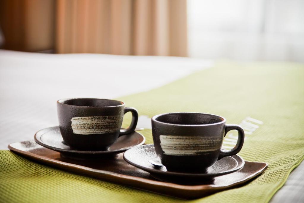 The Loft Seaside Suites Цзиньшань Номер фото